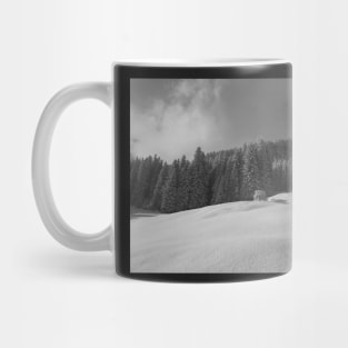 Storm over a winter forest Mug